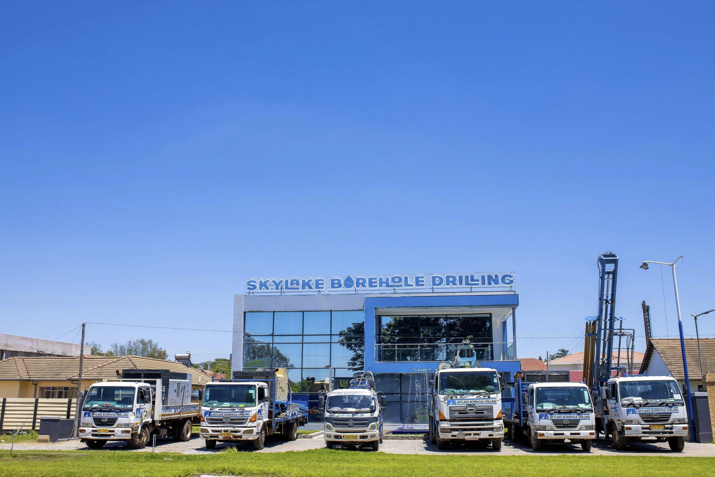 The Skylake Borehole Drilling fleet lined up outside the company yard